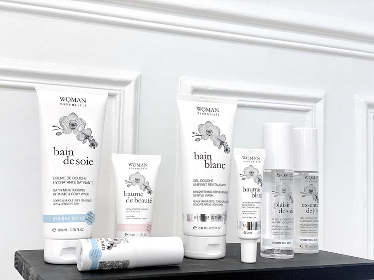 Woman Essentials intiimhooldustooted riiulil: Bain de Soie, Baume de Beauté, Bain Blanc, Baume Blanc, Plaisir de Soie ja Essence de Joie